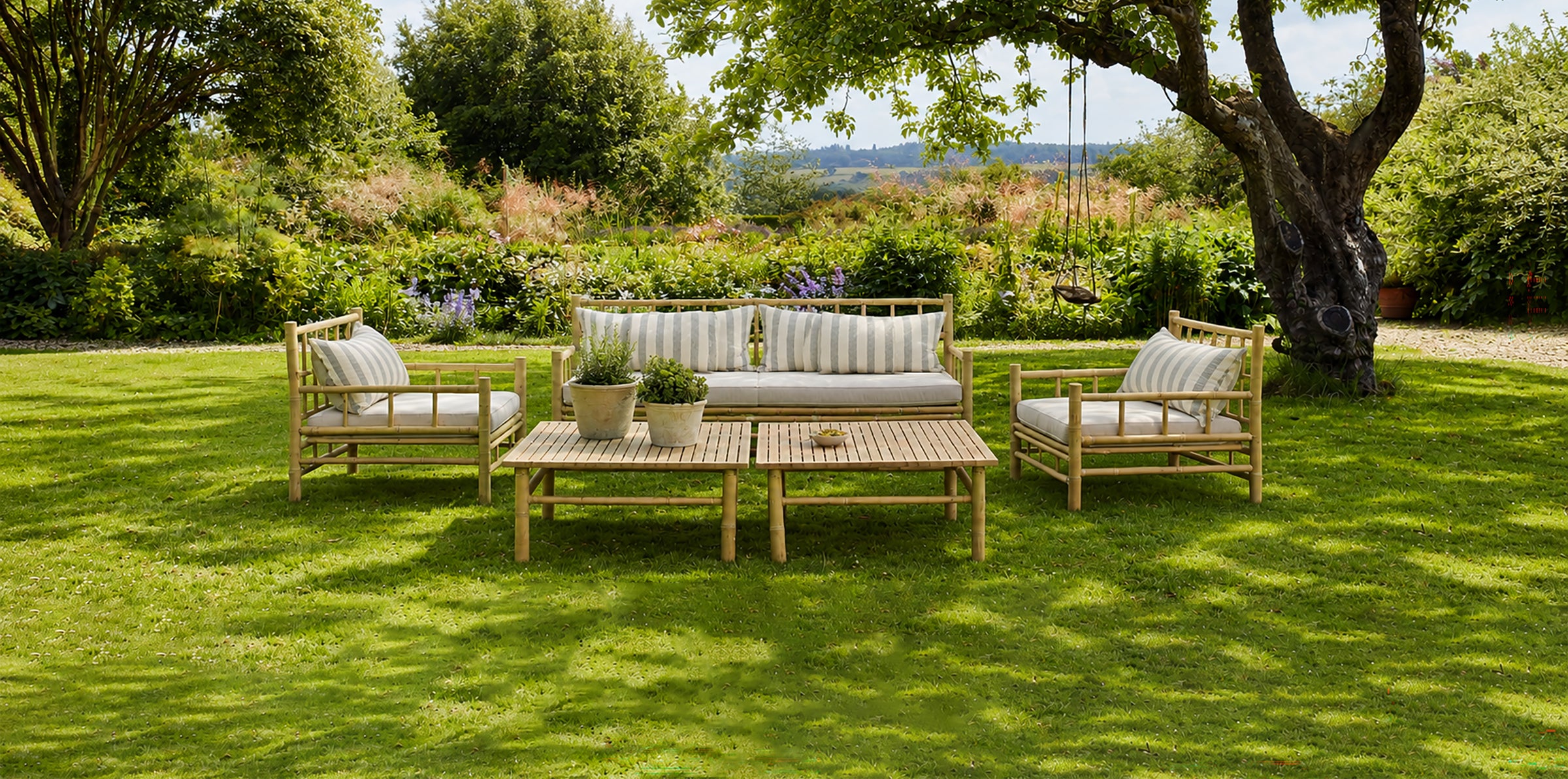 Outdoor garden setting featuring a bamboo furniture set
