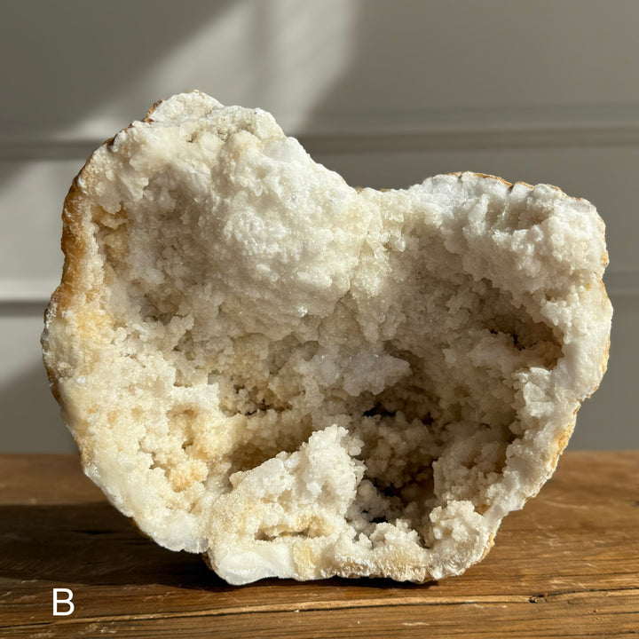 Large geode round rock with crystals