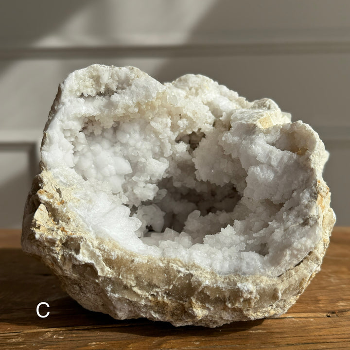Large geode round rock with crystals