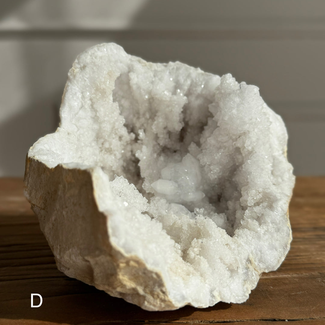 Large geode round rock with crystals