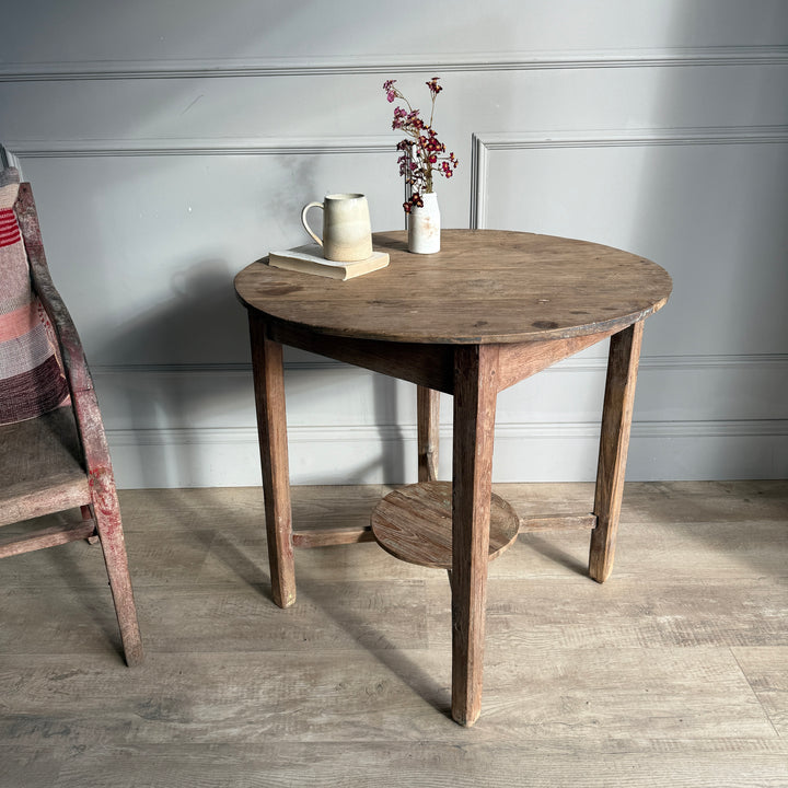 Mid century round side table | Surya