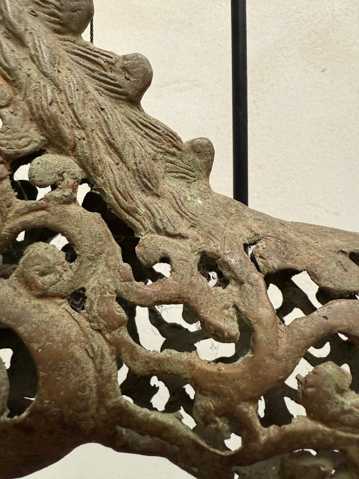 Large suspended bronze horse on stand