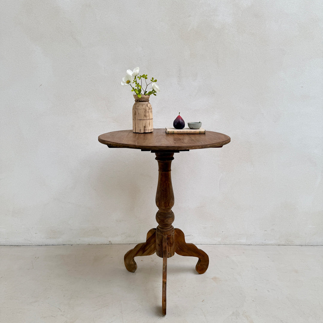 Knepp solid teak round side table handcrafted with an elegant pedestal base, perfect as an occasional table beside a sofa, armchair or reading chair.
