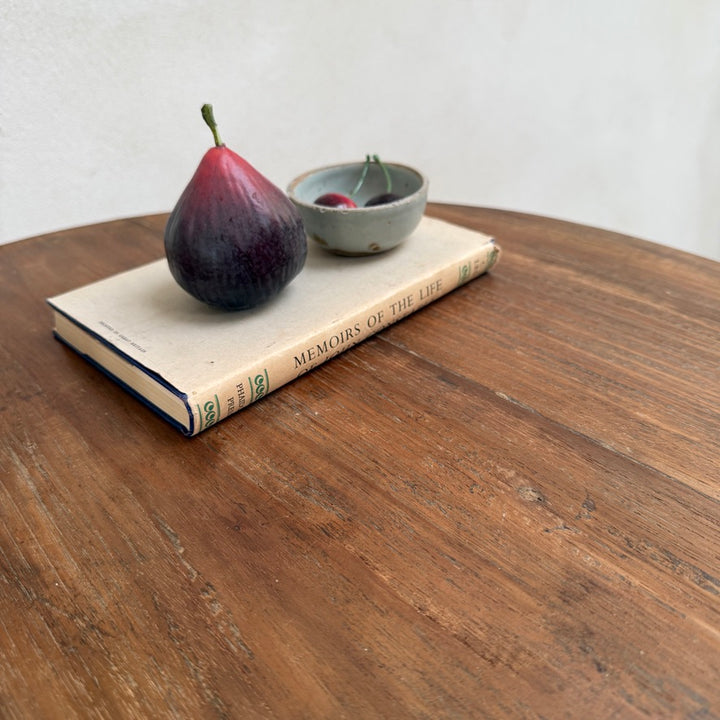 Close-up of the Knepp handcrafted solid teak side table showing the rich natural wood grain, smooth finish and authentic character of the timber.