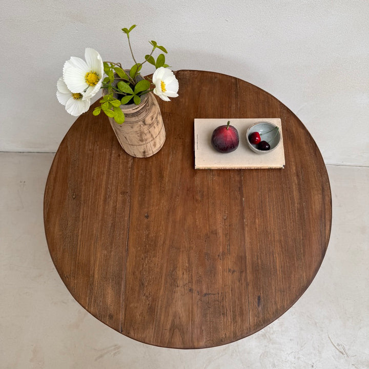 Top-down view of the Knepp handcrafted solid teak occasional table displaying the beautiful natural grain and generous round tabletop.