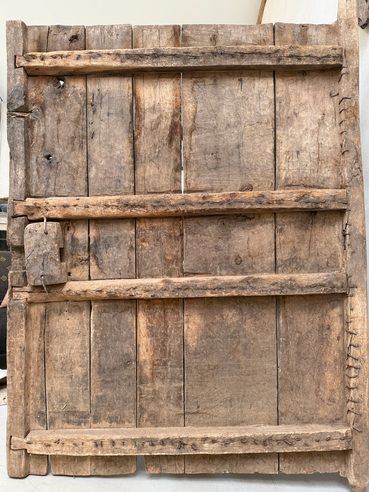 Vintage wooden crate with a rustic finish on a white background