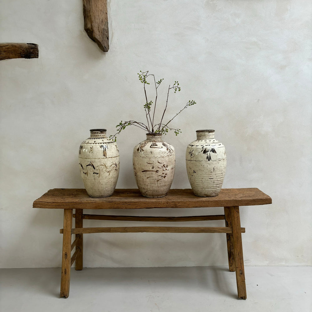 Large Ming Dynasty Pots styles on a console table