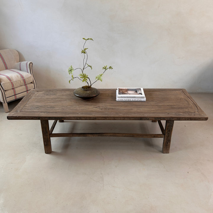 Front elevation of the Reclaimed Elm Coffee Table highlighting its balanced proportions, sturdy handcrafted construction and traditional stretcher base. Designed for timeless living spaces and everyday family life.