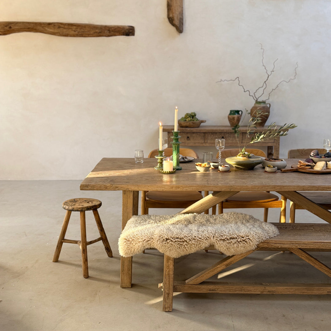 Reclaimed Elm Farmhouse Dining Table Cambridge with matching reclaimed elm bench, showcasing the solid timber construction, farmhouse cross-frame detailing and characterful salvaged wood. A timeless dining set designed for relaxed family living and contemporary country interiors.