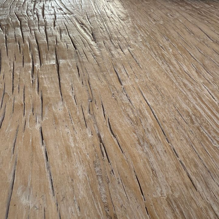 Close-up detail of the Reclaimed Elm Farmhouse Dining Table Cambridge, showing the characterful grain, natural texture and historic surface markings of salvaged elm timber. Each tabletop displays unique variations that celebrate the beauty of reclaimed wood furniture.