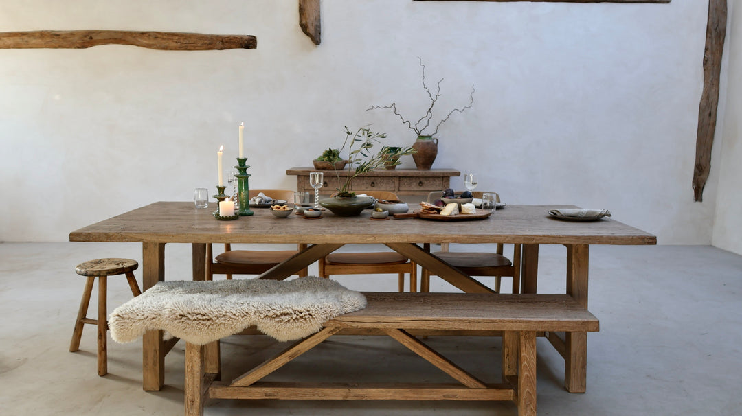 Front view of the Reclaimed Elm Farmhouse Dining Table Cambridge with matching reclaimed elm dining bench. Crafted from salvaged elm timber with a characterful rustic finish, shown in a relaxed farmhouse interior ideal for family dining, entertaining and everyday living.