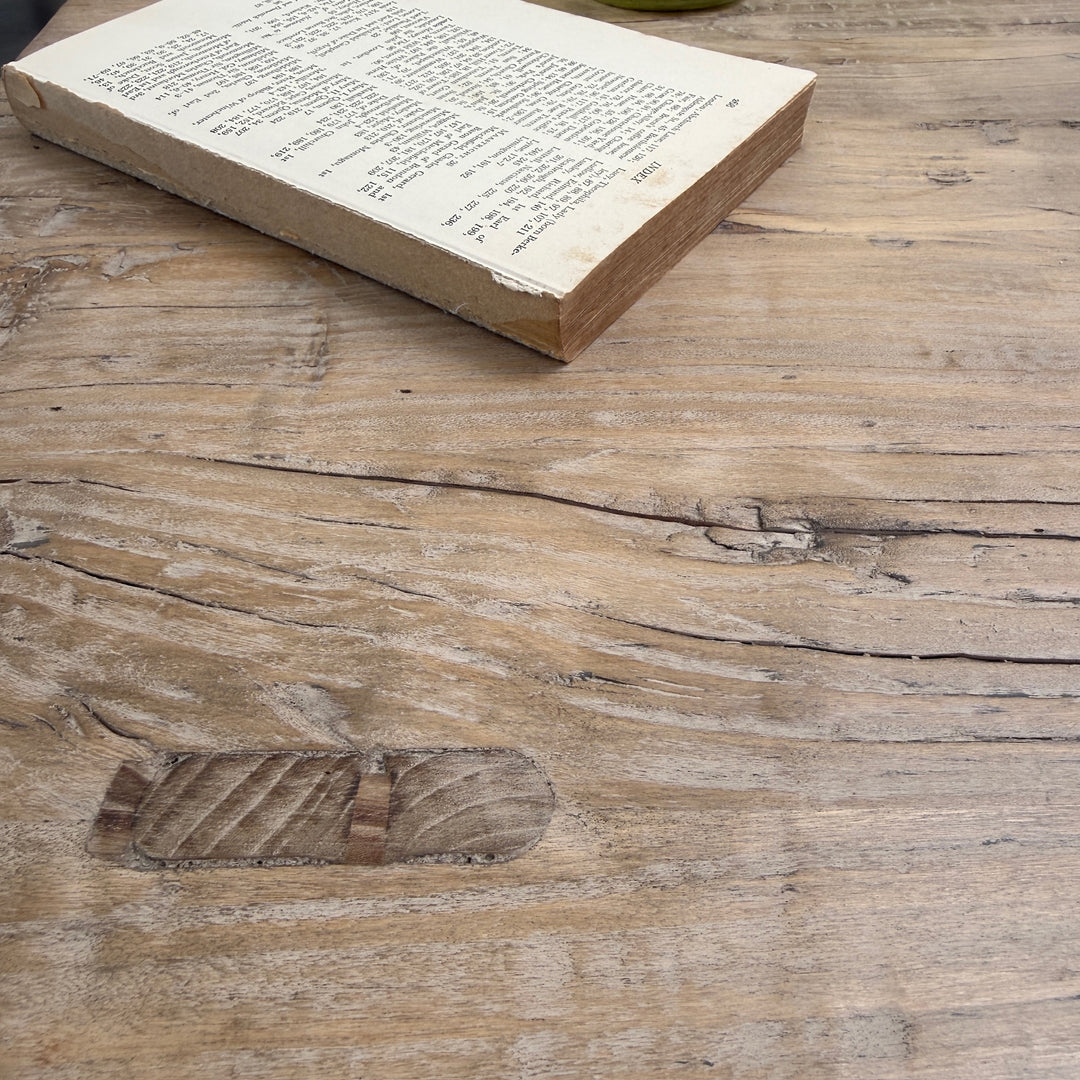 Old book on a wooden surface
