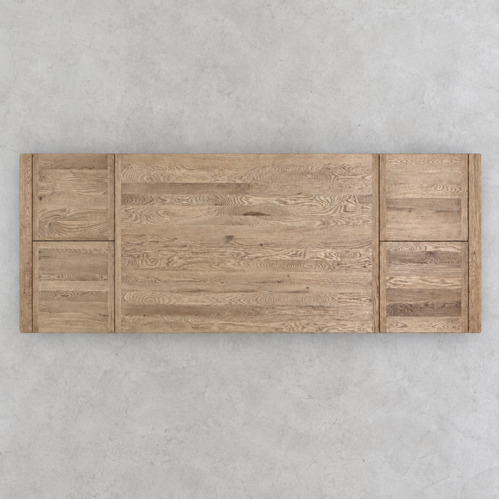 Overhead view of the reclaimed oak dining tabletop showing its rectangular form, individual oak boards and extension sections.