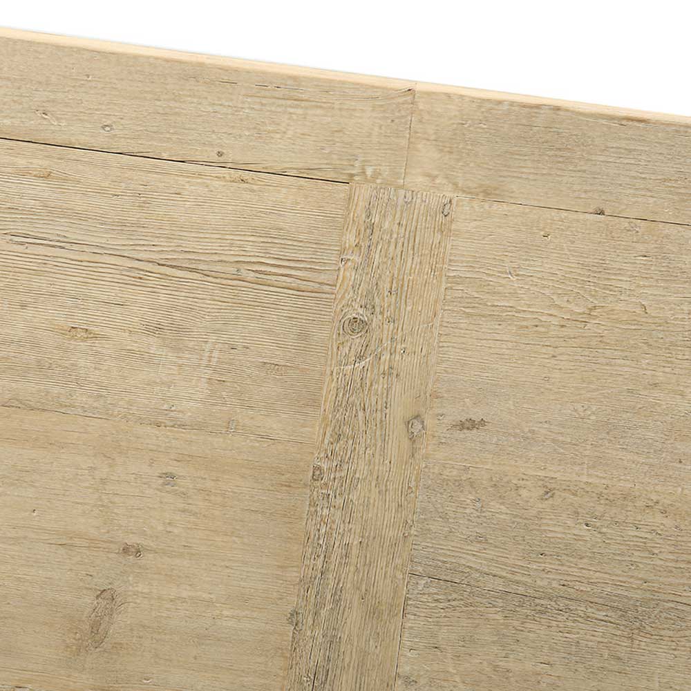 Close up of reclaimed pine dining table showing framed tabletop construction and naturally aged timber grain