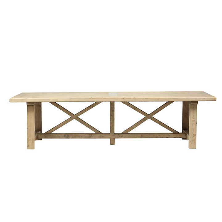 Side view of the substantial reclaimed pine refectory dining table and architectural cross frame base
