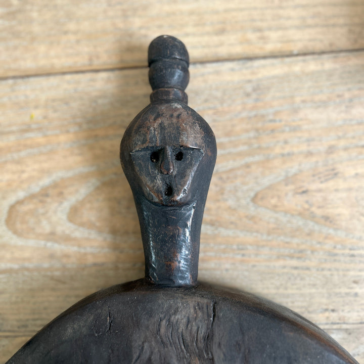 Round hand-carved wood pounding board | Rama