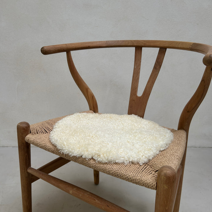 Round sheepskin seat topper