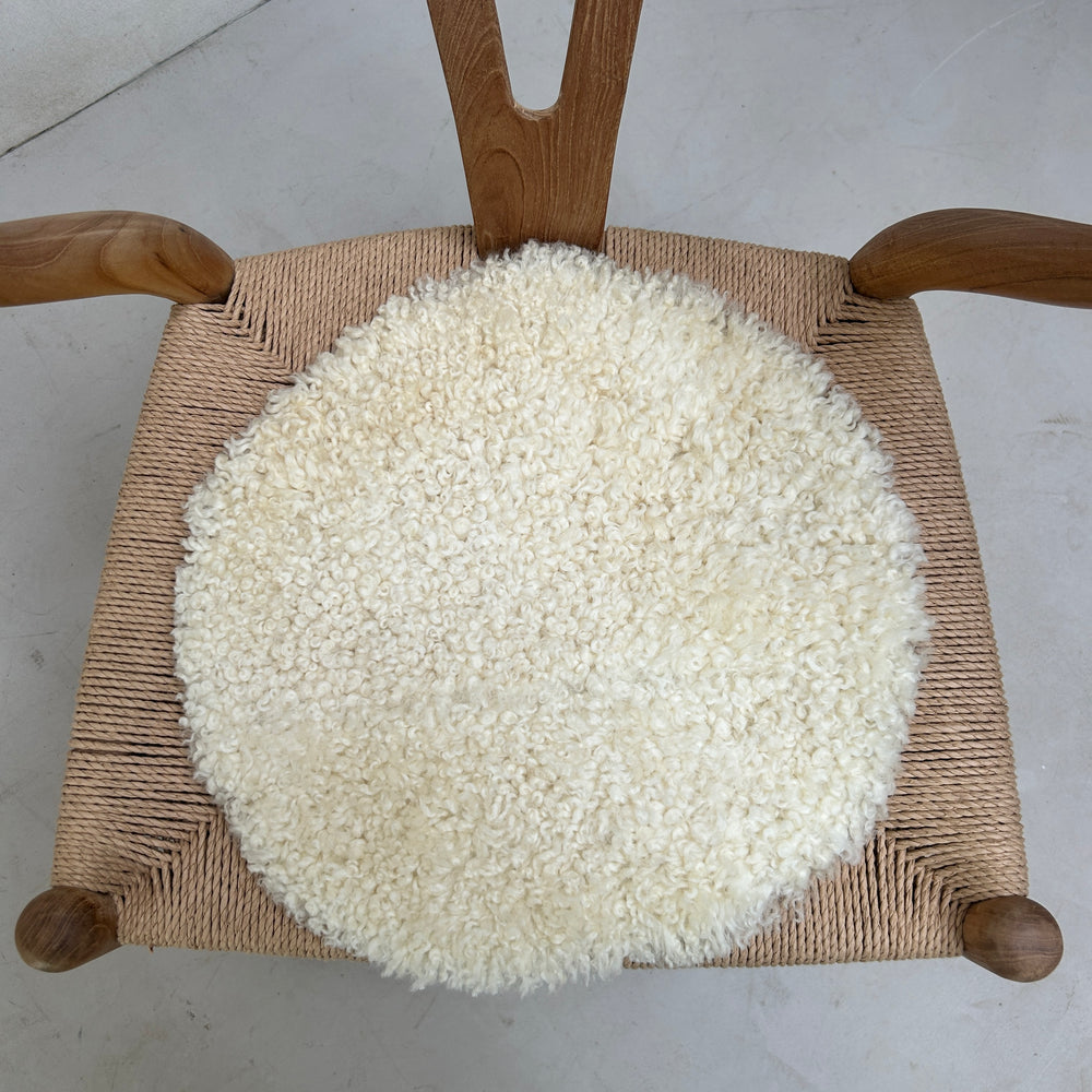 Round sheepskin seat topper 