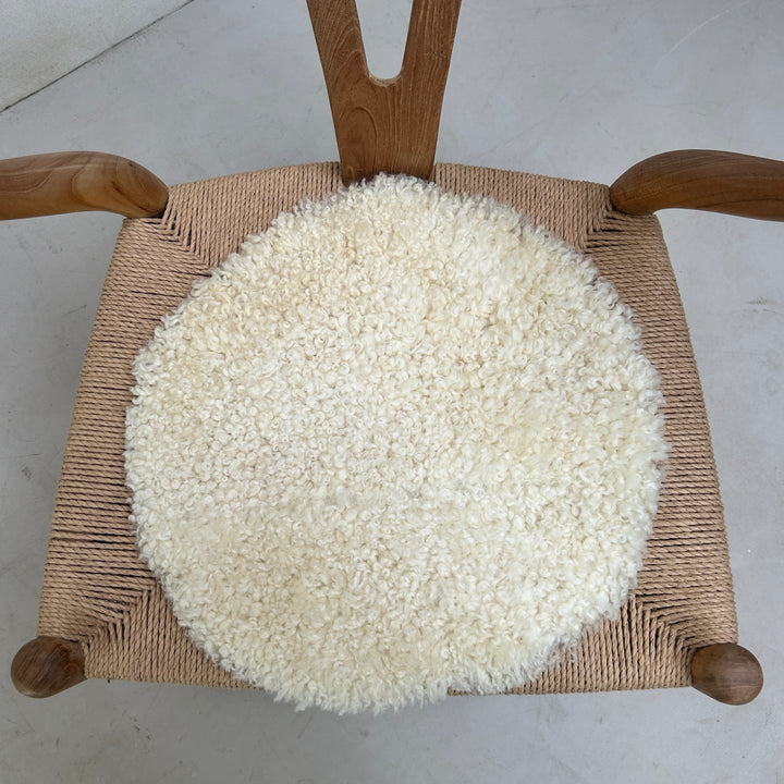 Round sheepskin seat topper 