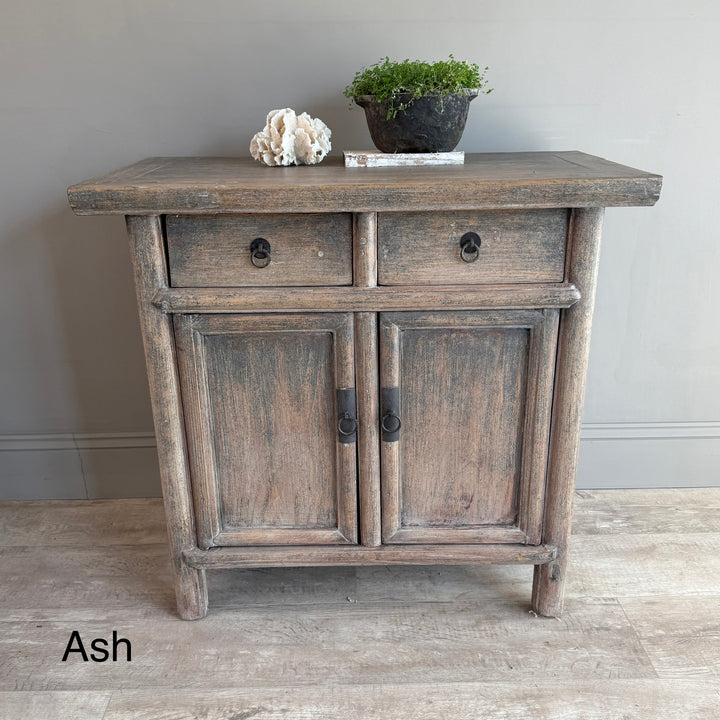 Wooden sideboard with two drawers and two doors in a rustic &