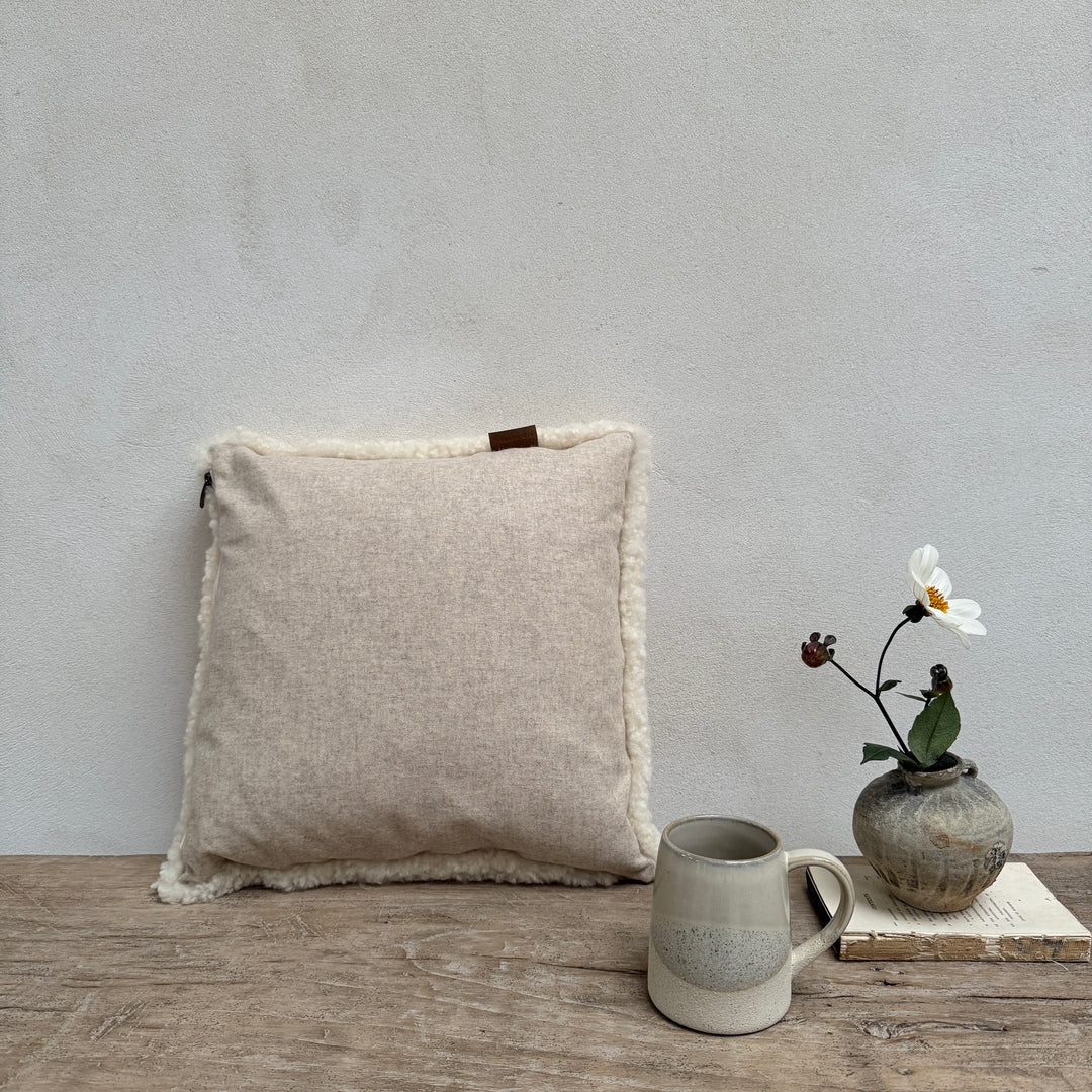 Square sheepskin cushion neutral