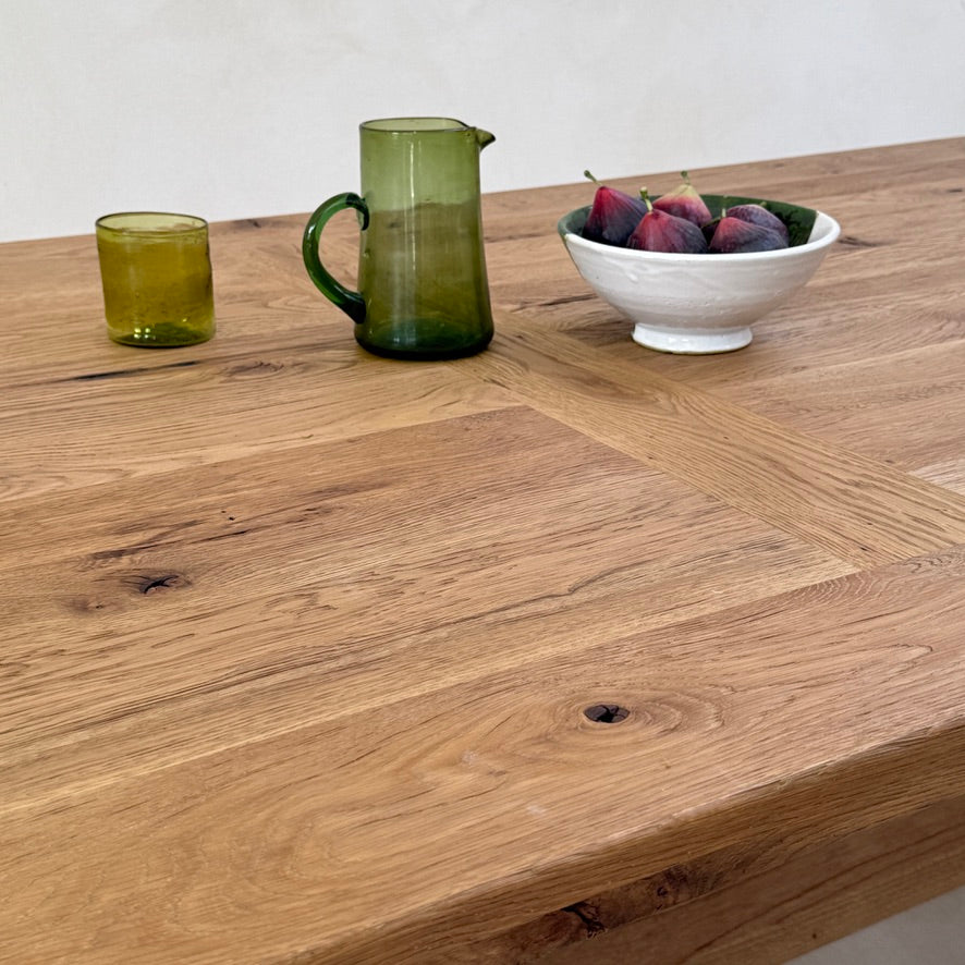 Generous Suffolk reclaimed oak dining table surface styled for relaxed contemporary dining