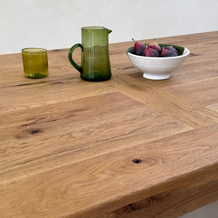 Generous Suffolk reclaimed oak dining table surface styled for relaxed contemporary dining