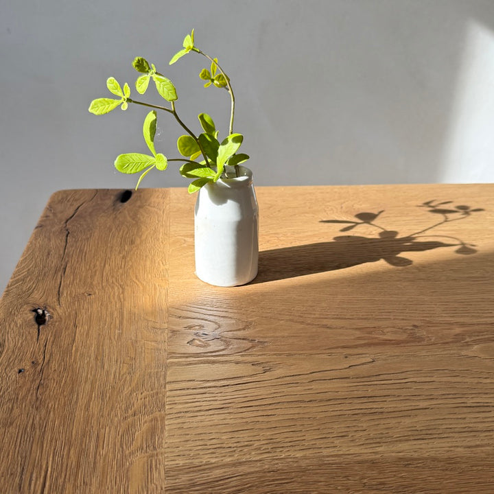 Close up of the Suffolk reclaimed oak tabletop showing beautifully textured natural grain