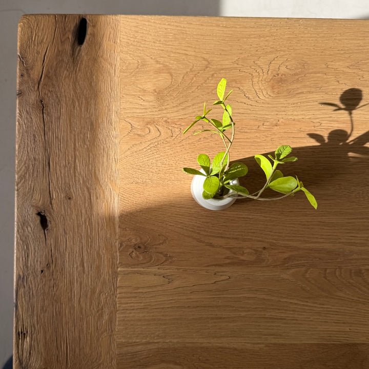 Textured reclaimed oak tabletop on the Suffolk dining table with warm natural grain