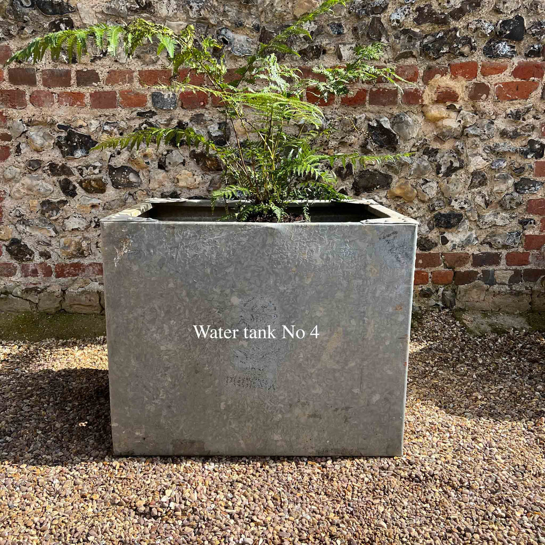 Vintage galvanised water tanks