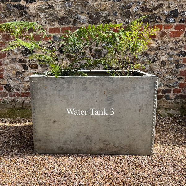 Vintage galvanised water tanks