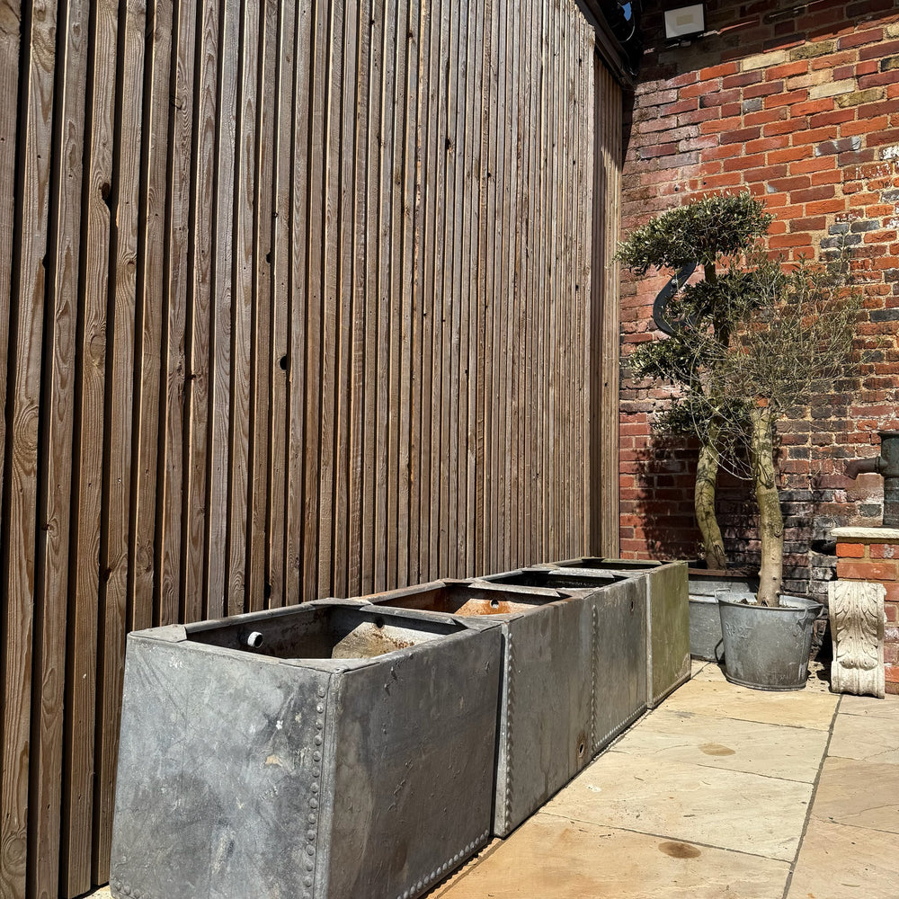 Vintage galvanised water tanks