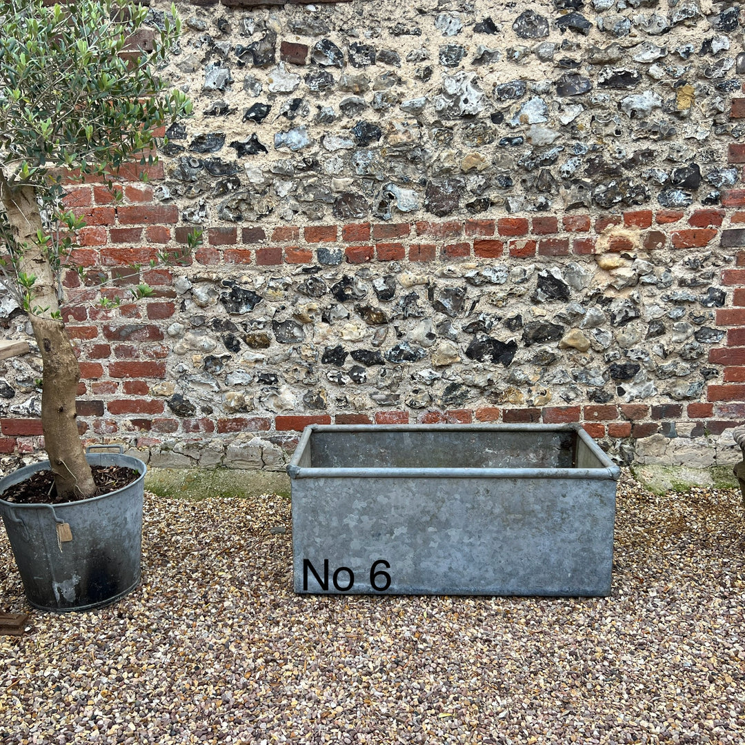 Vintage galvanised water troughs