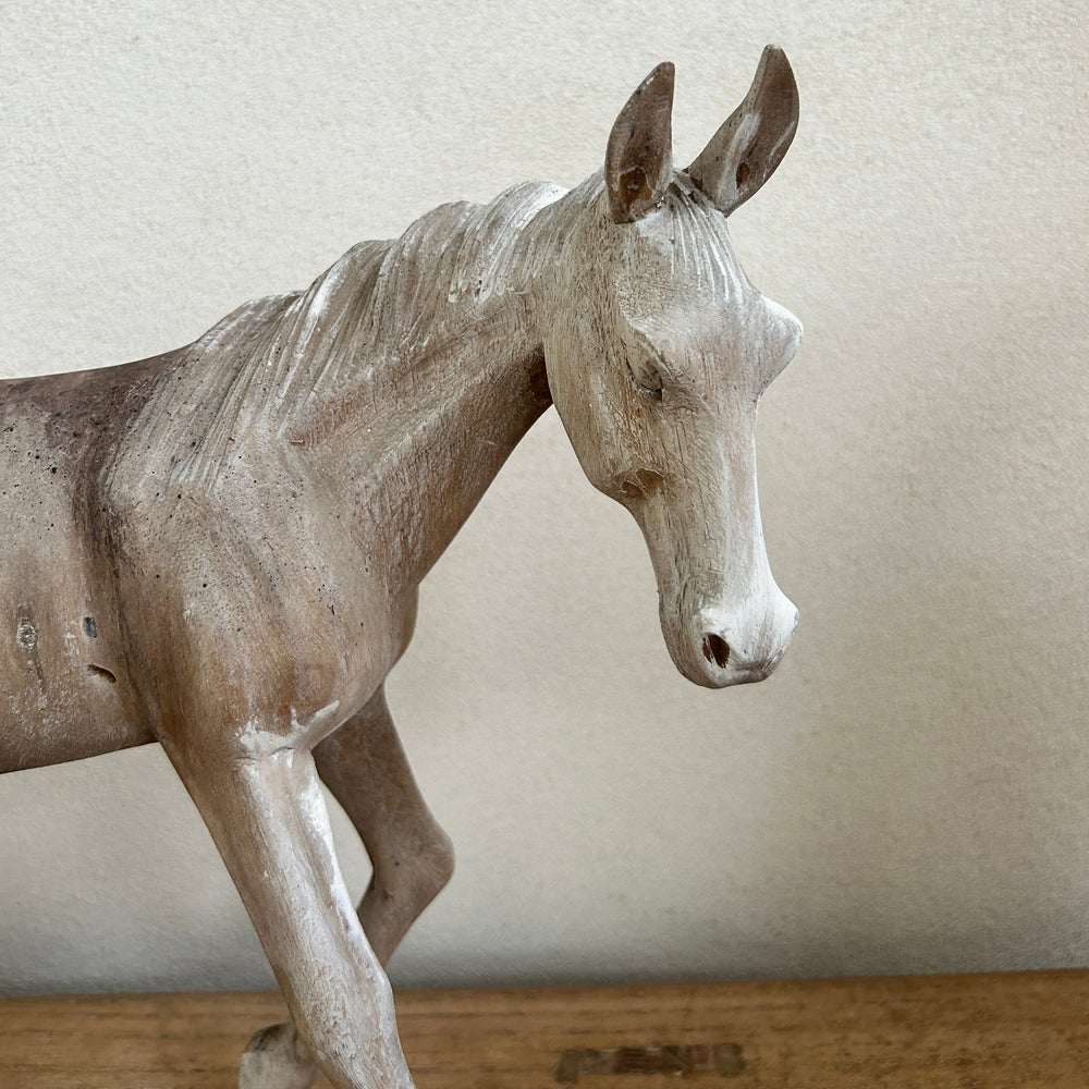 Vintage hand-carved wooden horses 