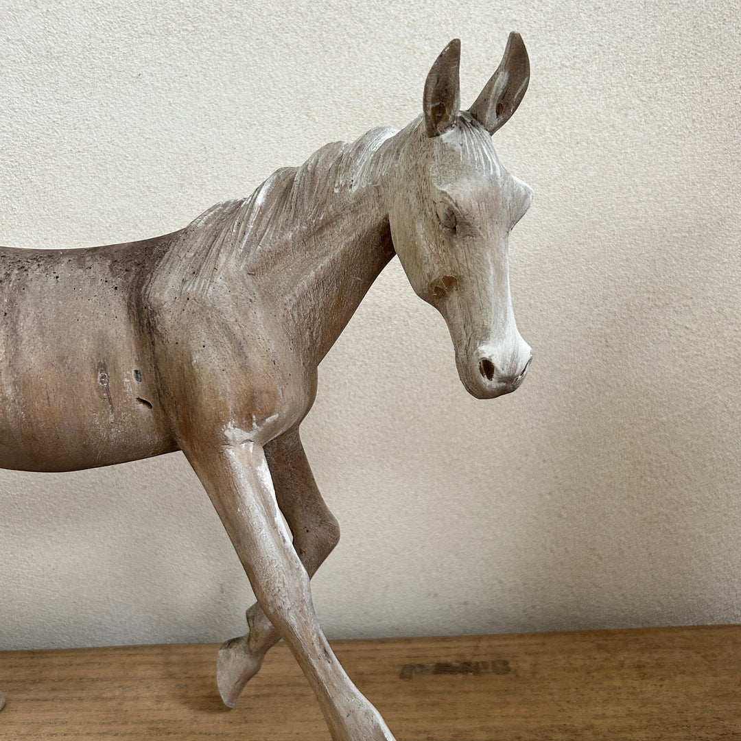 Vintage hand-carved wooden horses