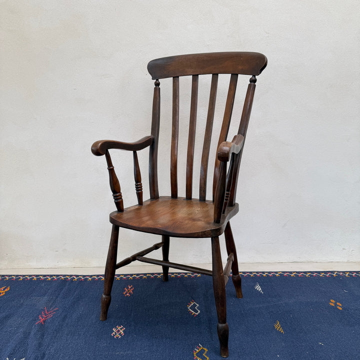 Front three-quarter view of the Antique Victorian Elm Windsor Chair Harry.