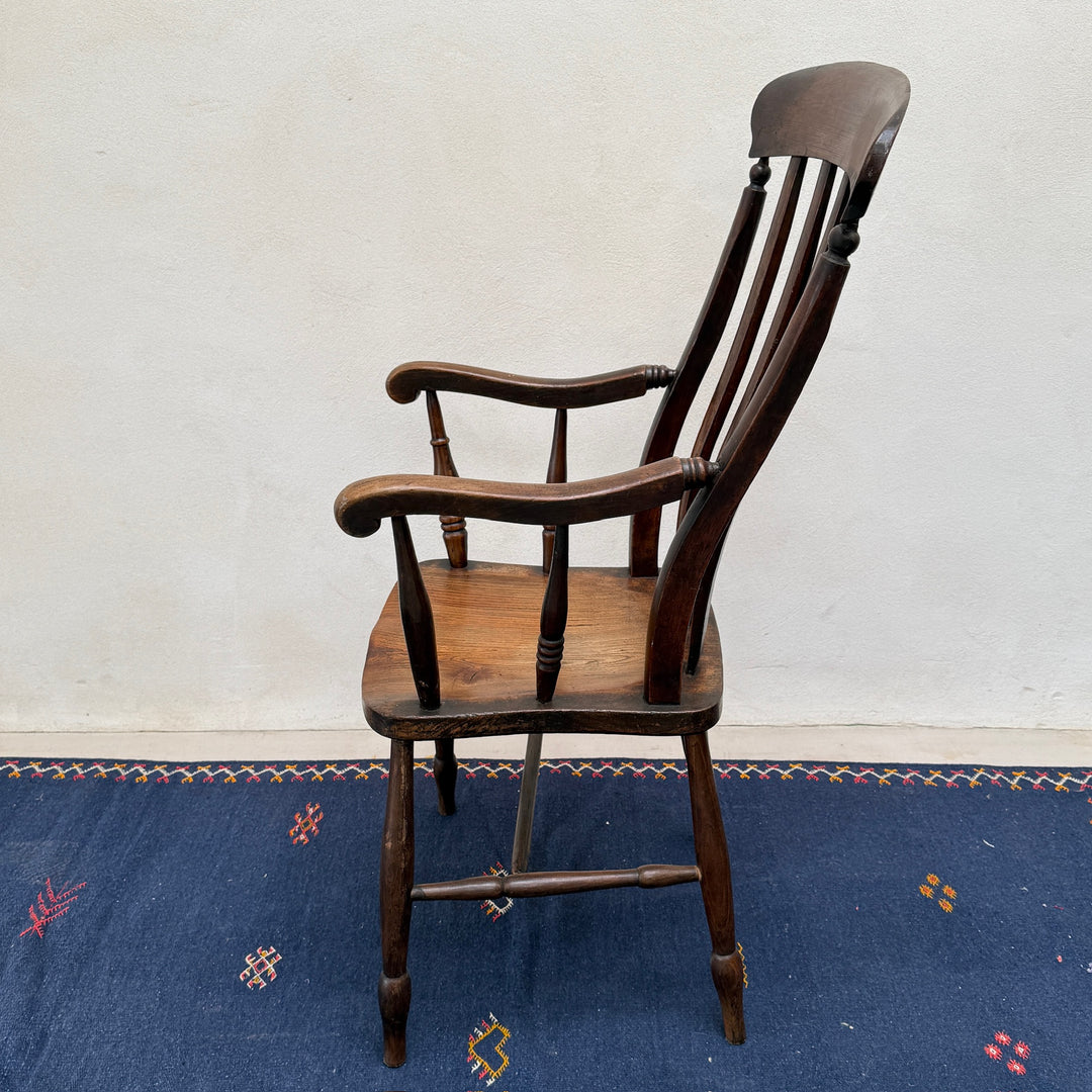 Side profile of the Antique Victorian Elm Windsor Chair Harry showing its elegant proportions and traditional construction.
