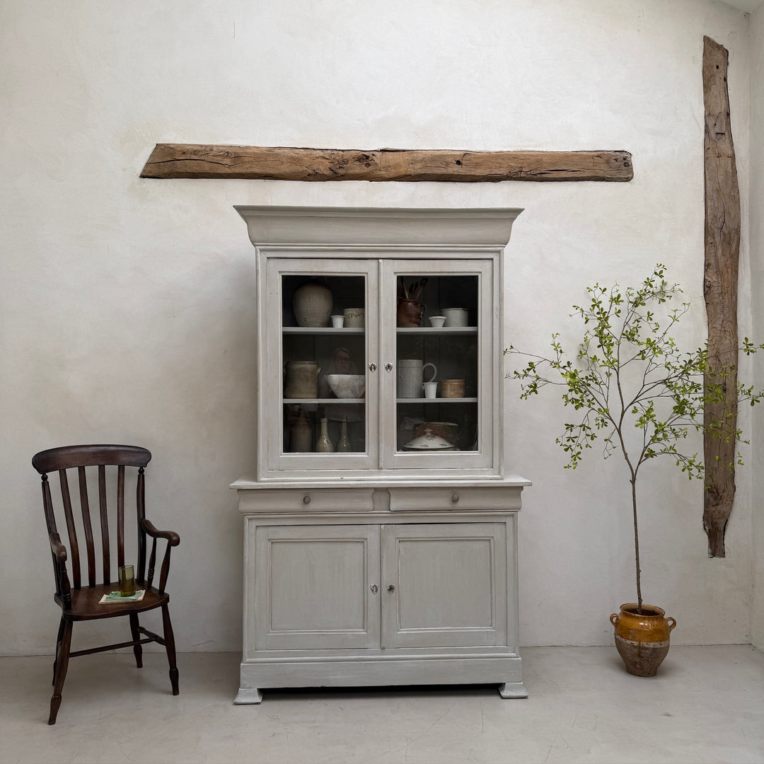 Angled front view of the antique French painted oak Buffet Deux Corps cabinet.

