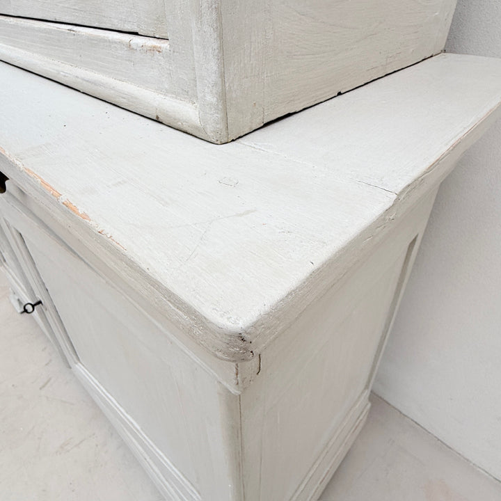 Corner detail showing the handcrafted painted oak construction and aged finish.
