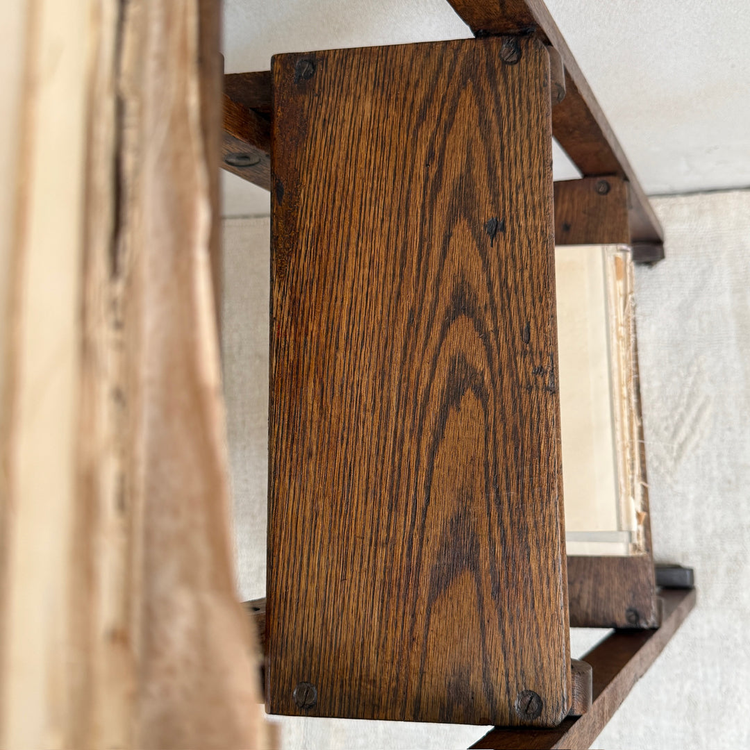 Detail of the solid timber steps and aged finish on the Antique English Library Ladder Margot.
