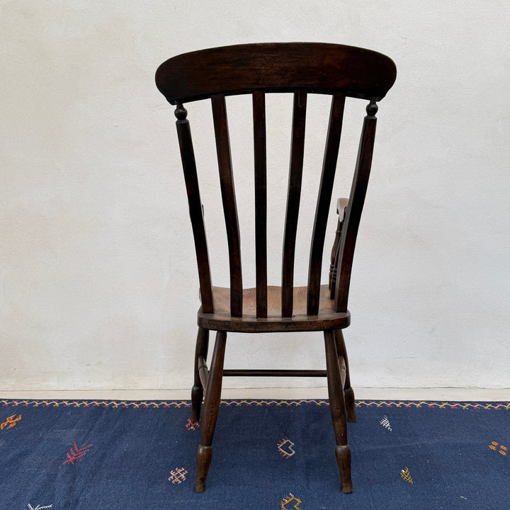 Rear view of the Antique Victorian Elm Windsor Chair Harry highlighting its classic spindle-back design.
