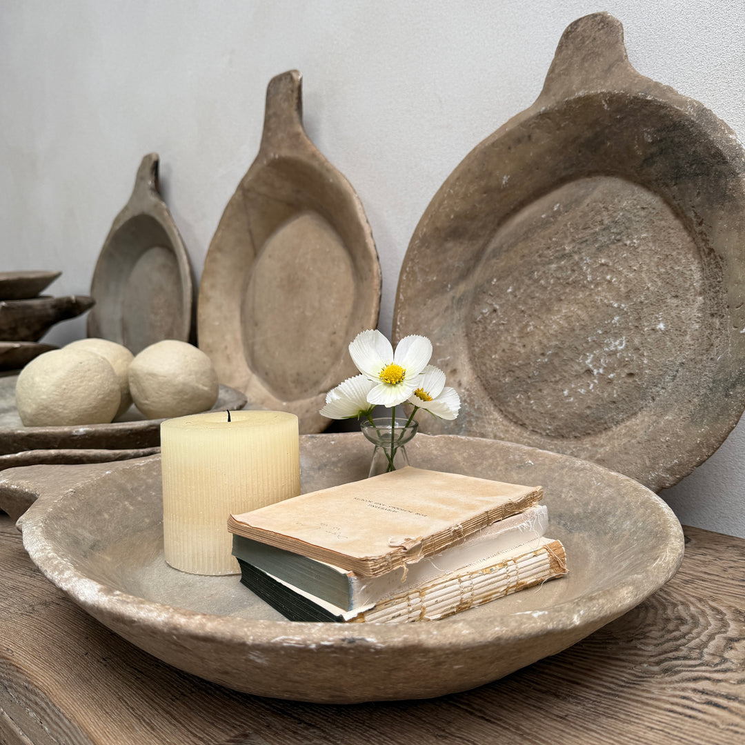Antique Indian marble bowl hand carved from solid stone with a softly aged patina, styled as a decorative centrepiece for rustic, contemporary and farmhouse interiors.
