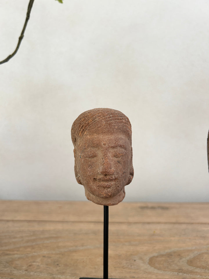 hand-carved antique terracotta heads on stand | Sita 