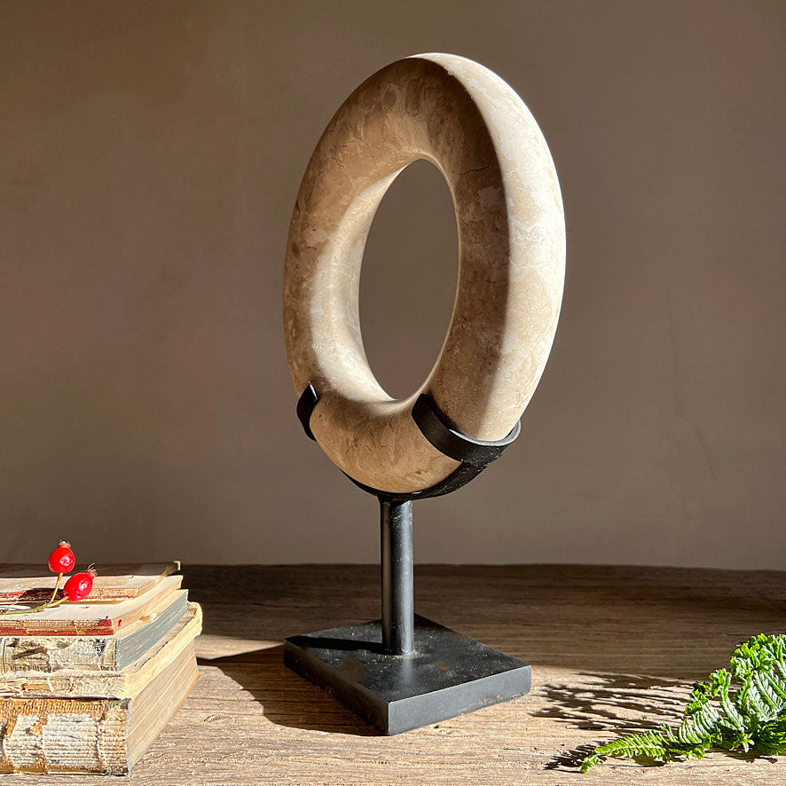 Marble circle on stand