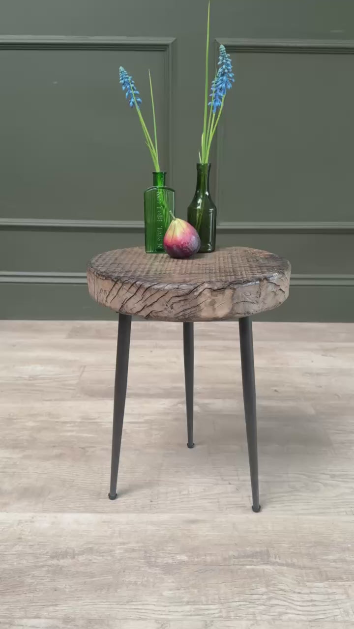 Video showing the Small Rustic Elm Side Table Eva from multiple angles, highlighting the solid elm top and cast iron hairpin legs.