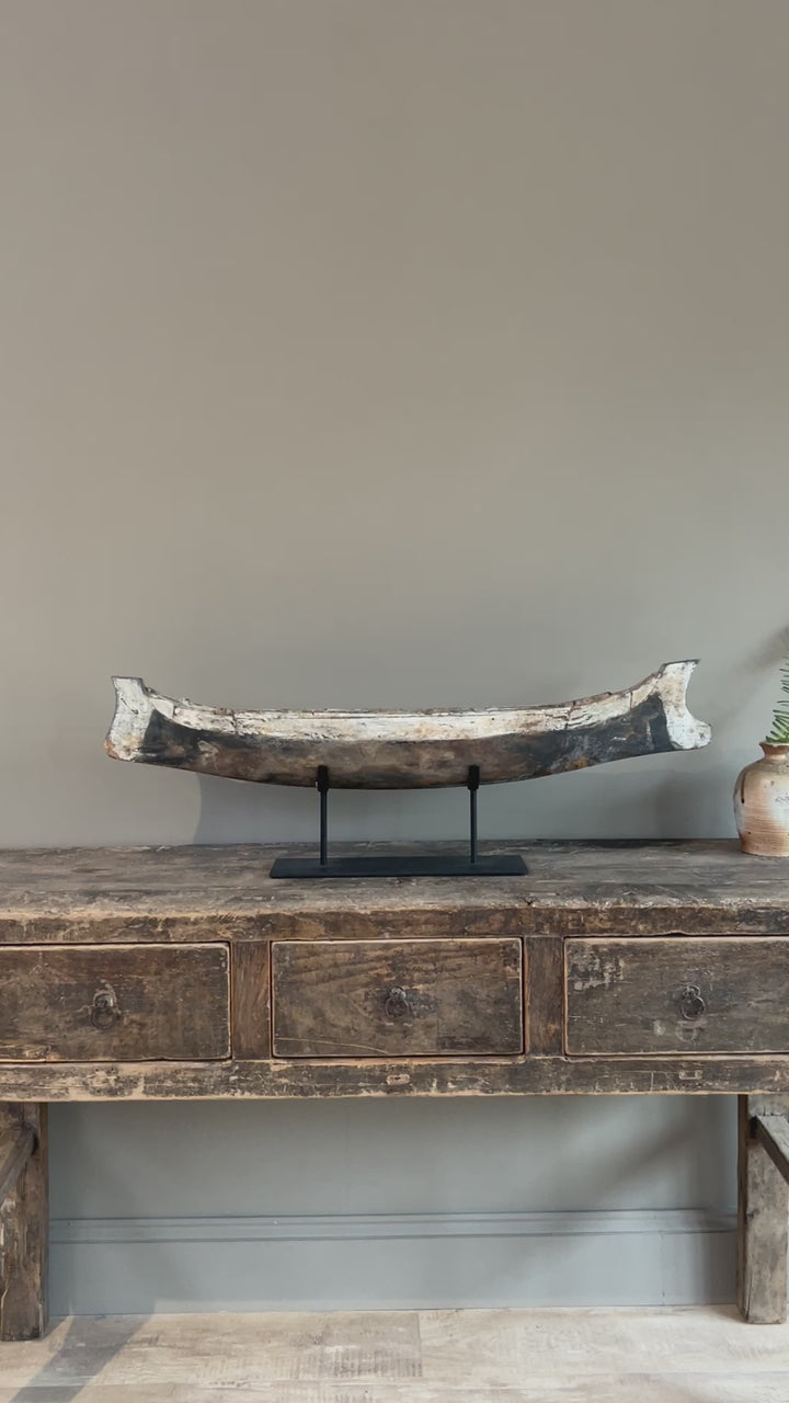 Antique wooden boat on stand | Krishna