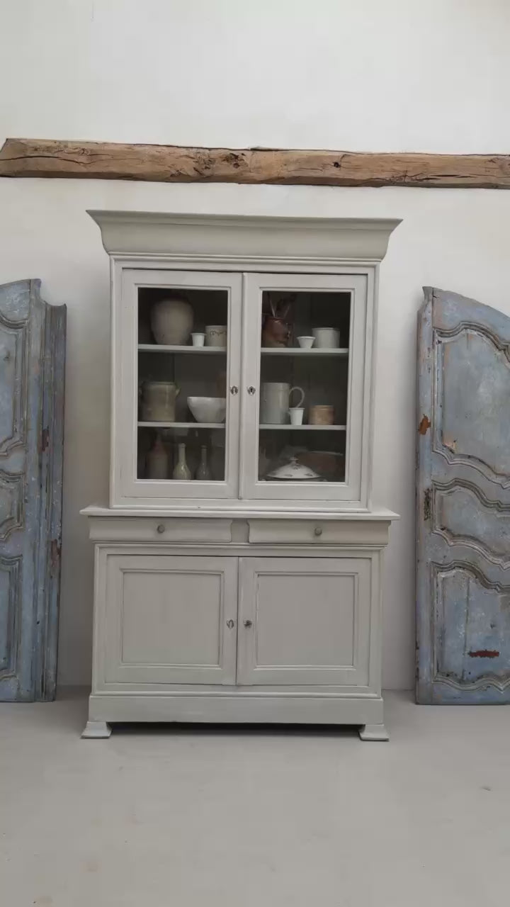 Video showing the antique French painted oak Buffet Deux Corps cabinet.
