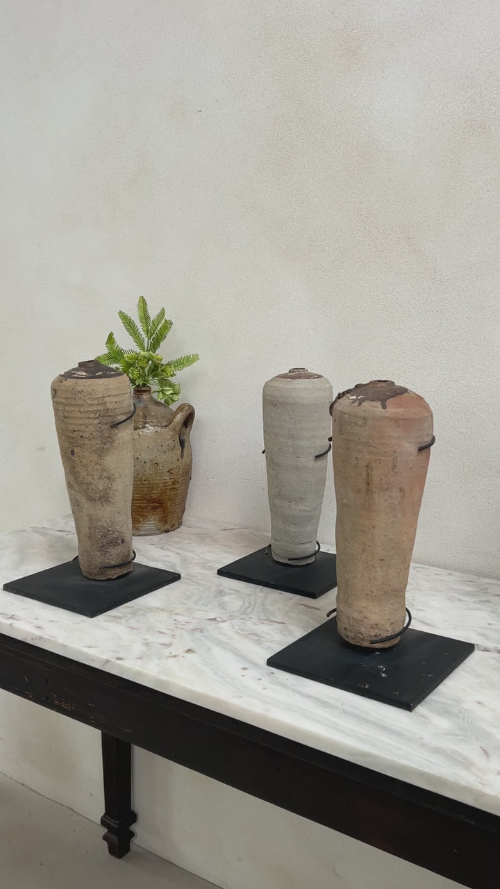 Antique mercury vessel on stand