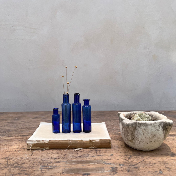 Set of Four Blue Victorian Bottles