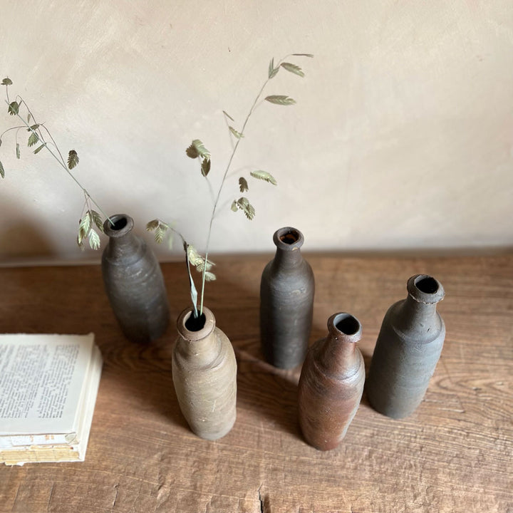 Small unglazed antique cider bottle